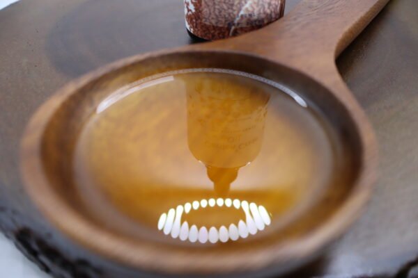 decorative wooden spoon full of garden cress natural oil